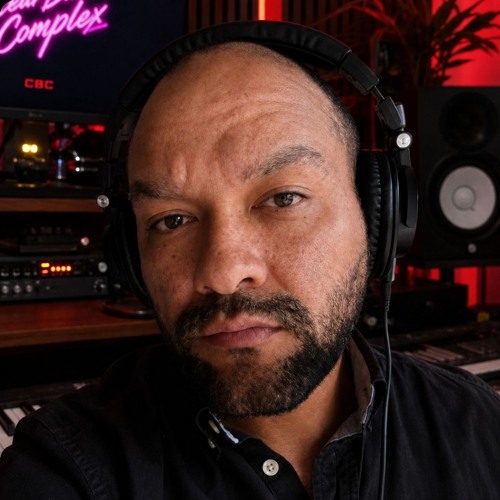 Samuel Rivera’s current CBC profile portrait, wearing headphones in the studio